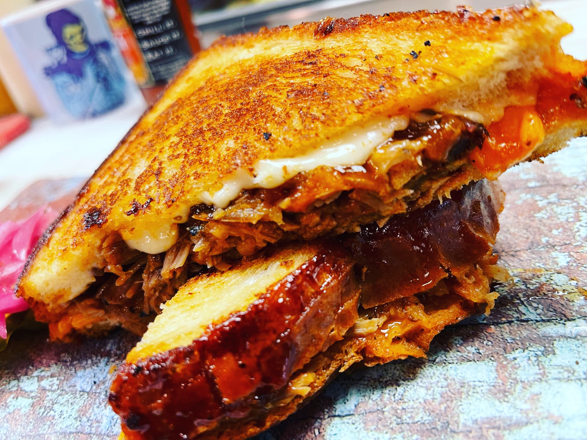 Pressed brisket grilled cheese with bacon and tomato jam