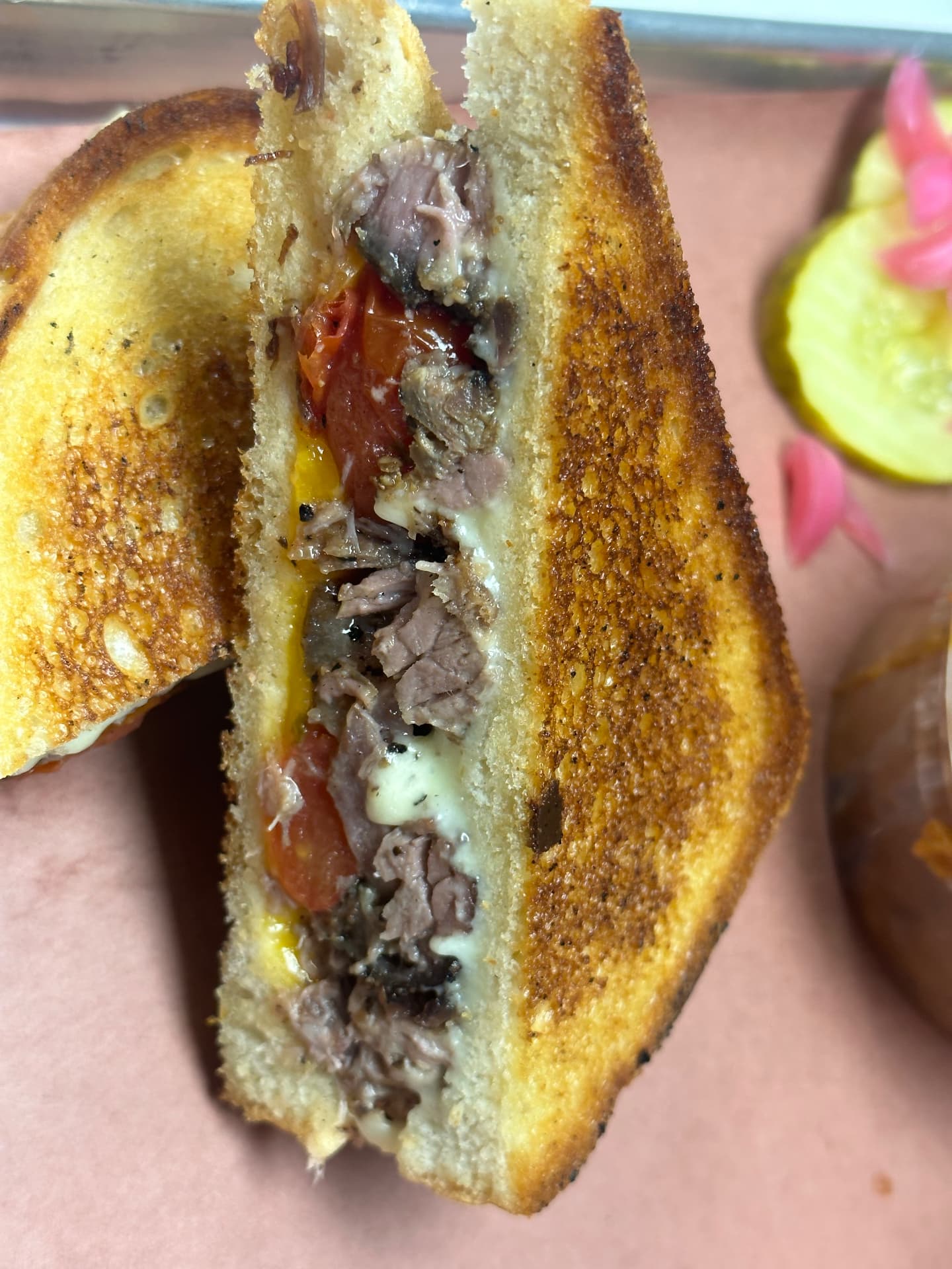 Brisket grilled cheese sliced open