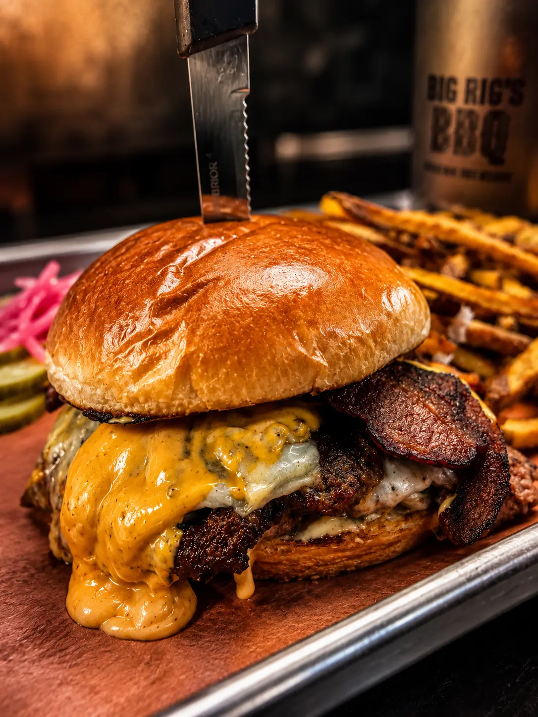 Smoky bacon cheeseburger with house sauce and seasoned fries