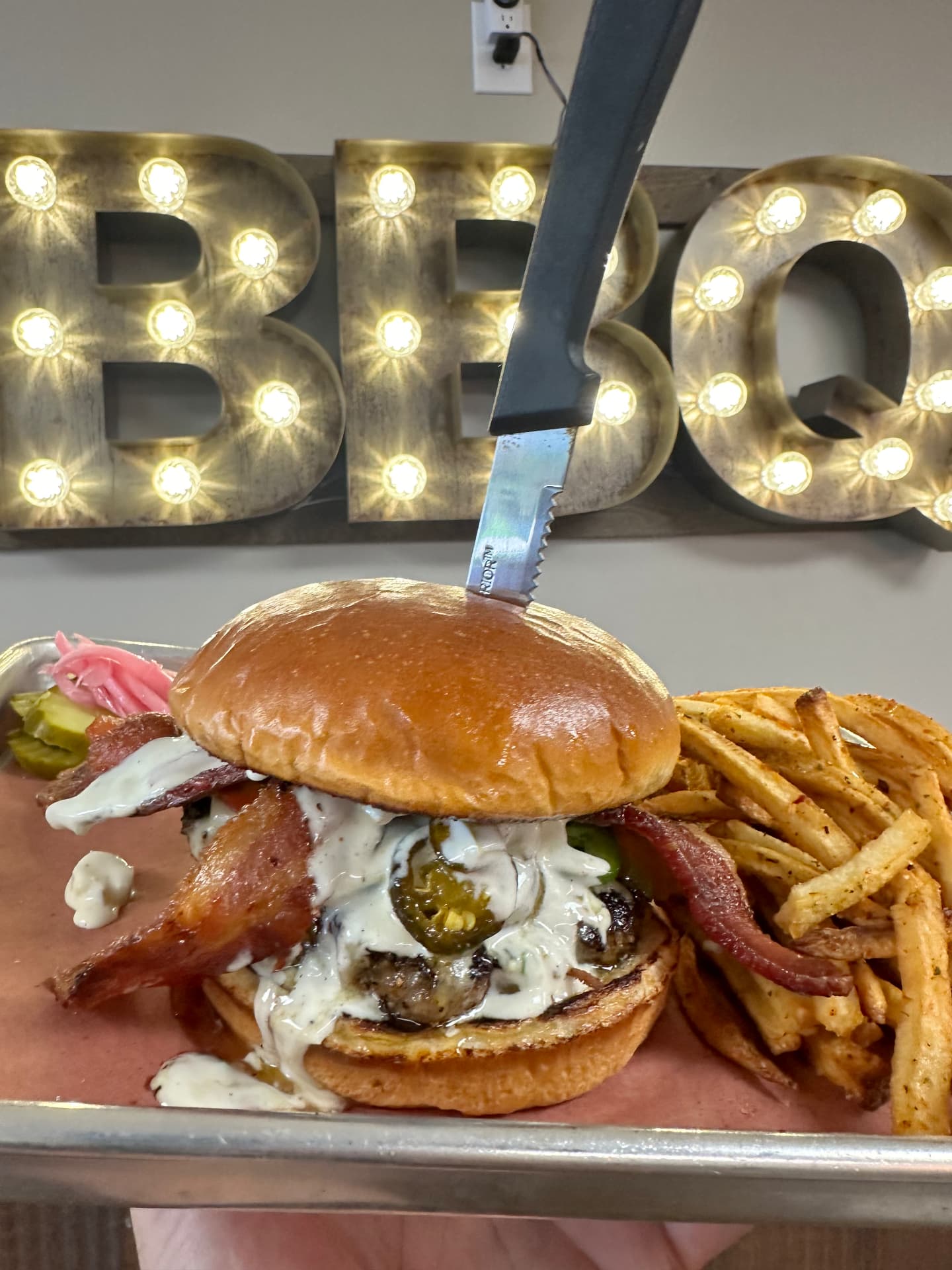 Bacon cheeseburger with jalapeños and creamy ranch