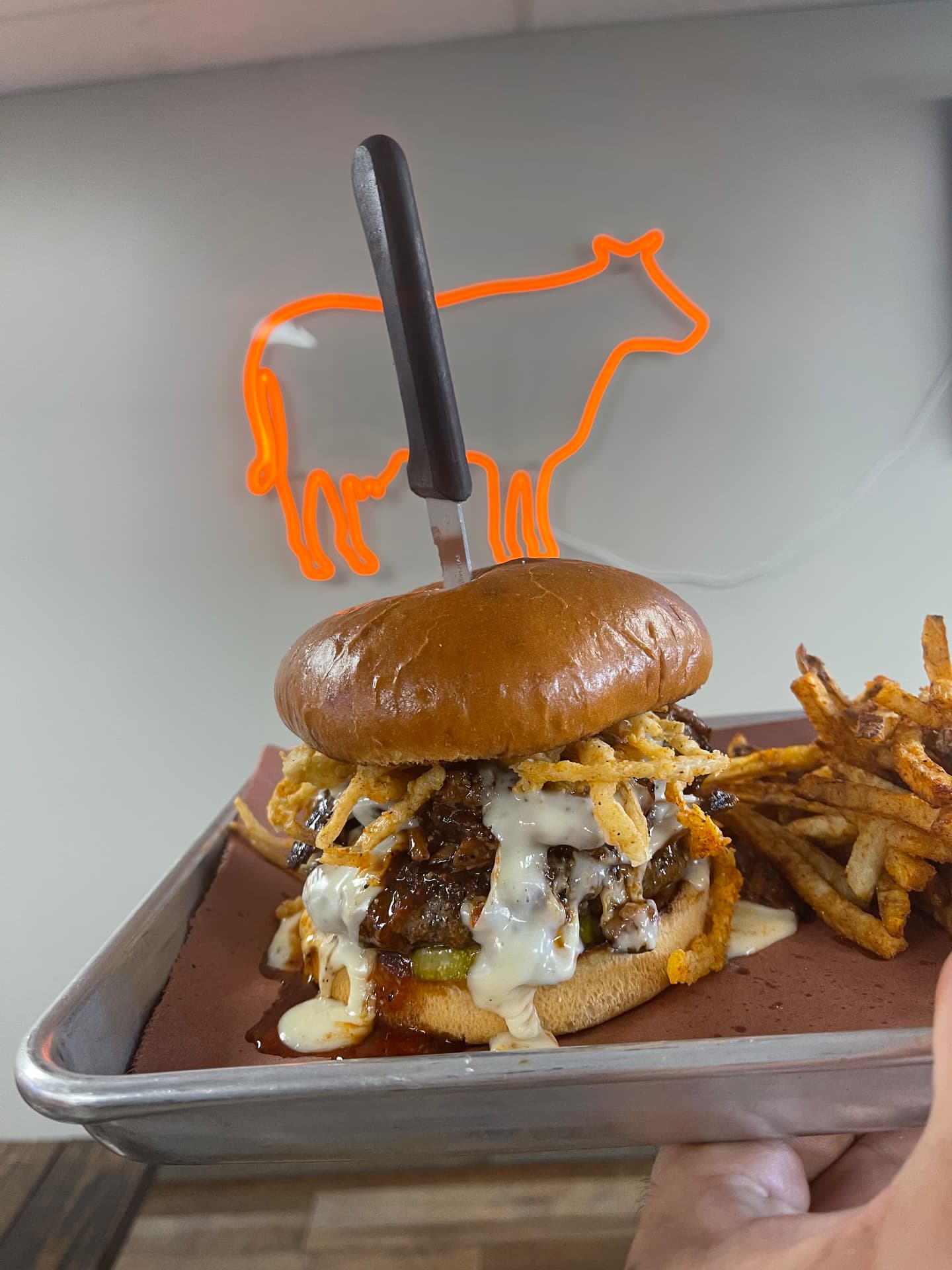 Burger of the week beneath the Big Rig's cow sign