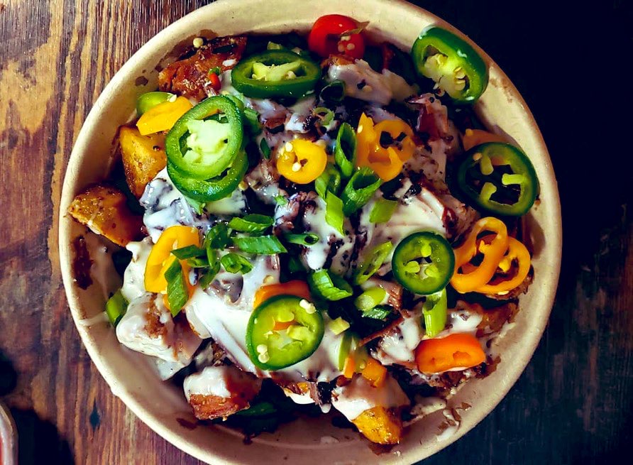 Loaded twice fried potatoes with peppers