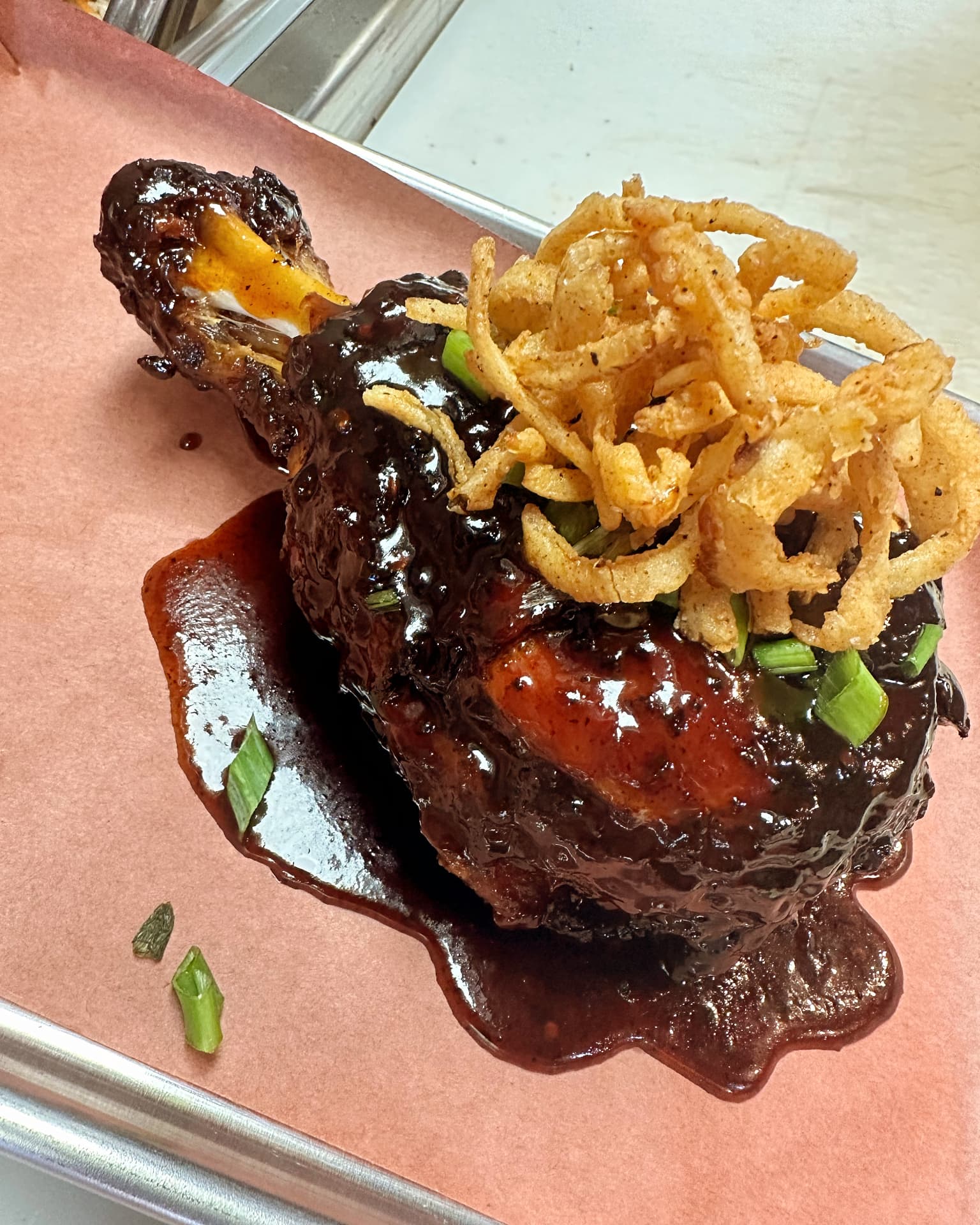 Glazed smoked chicken topped with crispy onions